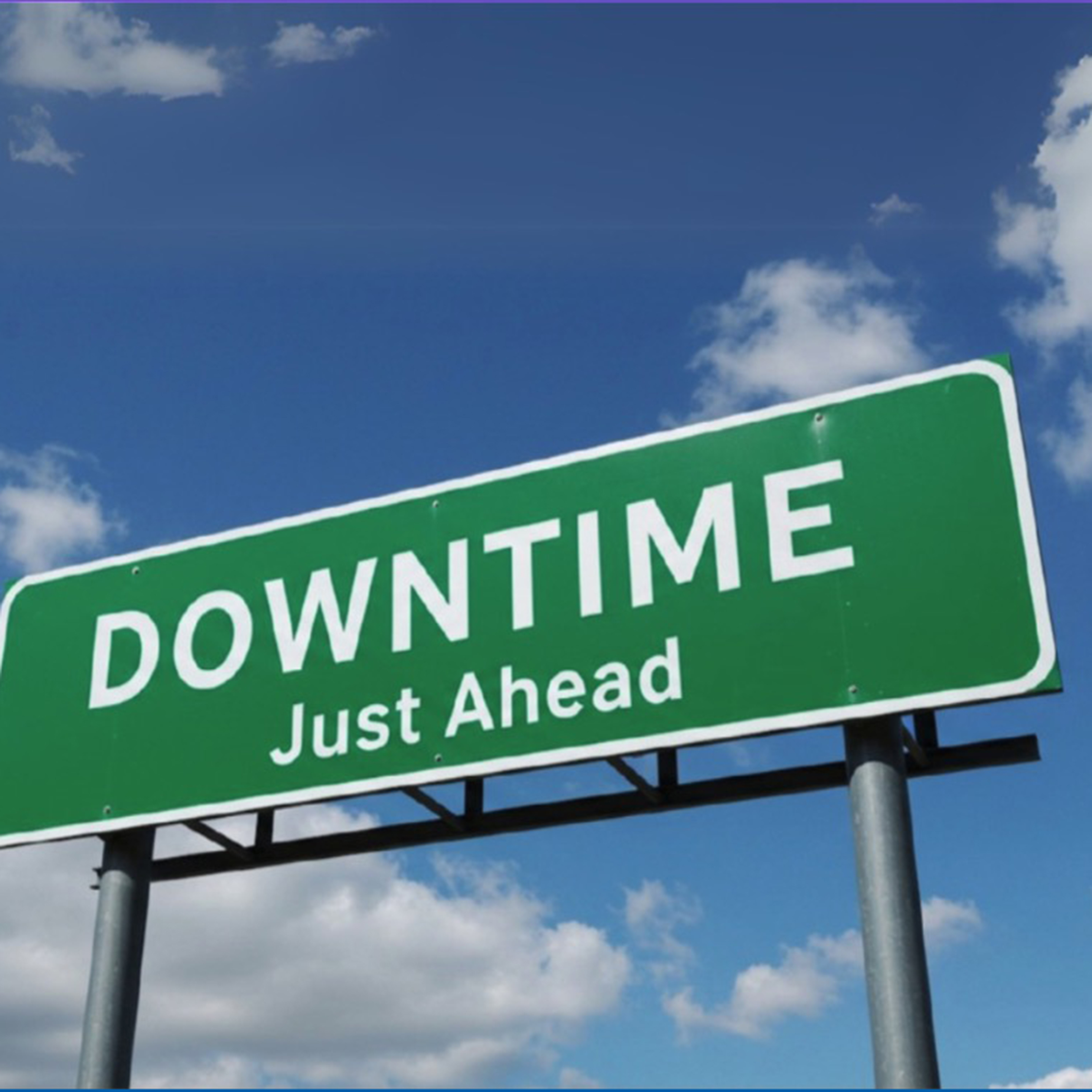 Street sign reading Unplanned Downtime Just Ahead